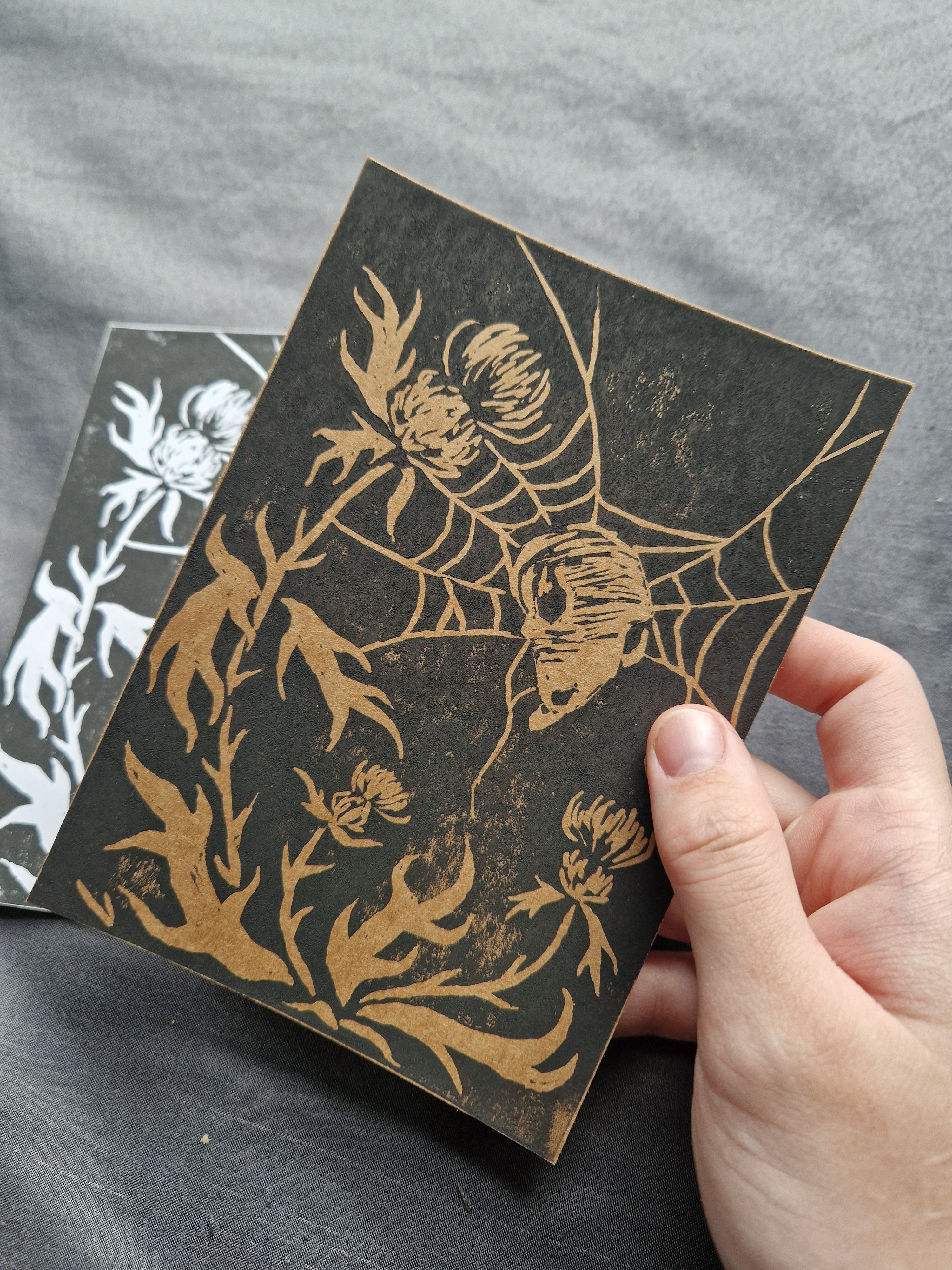 Skull in a Web - lino print